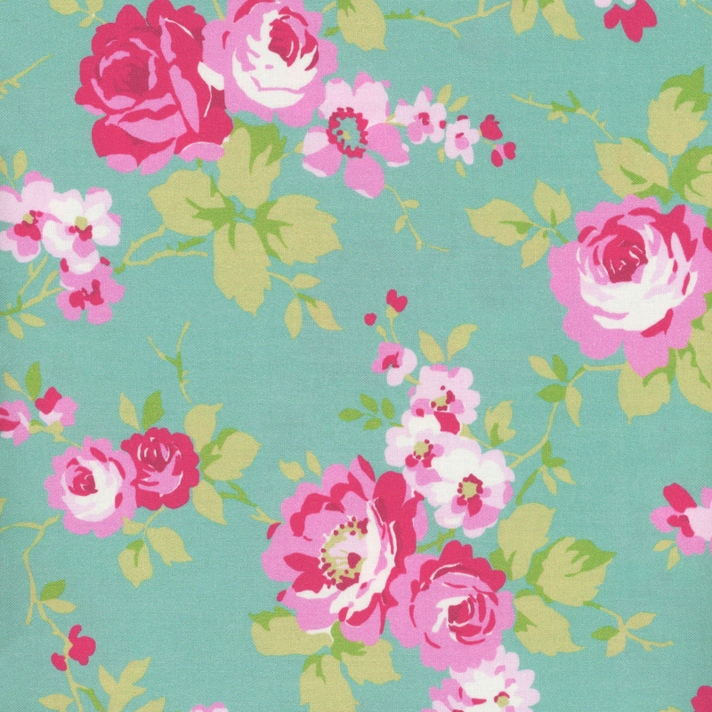 Bright teal fabric with bright pink roses and green stems and leaves across it
