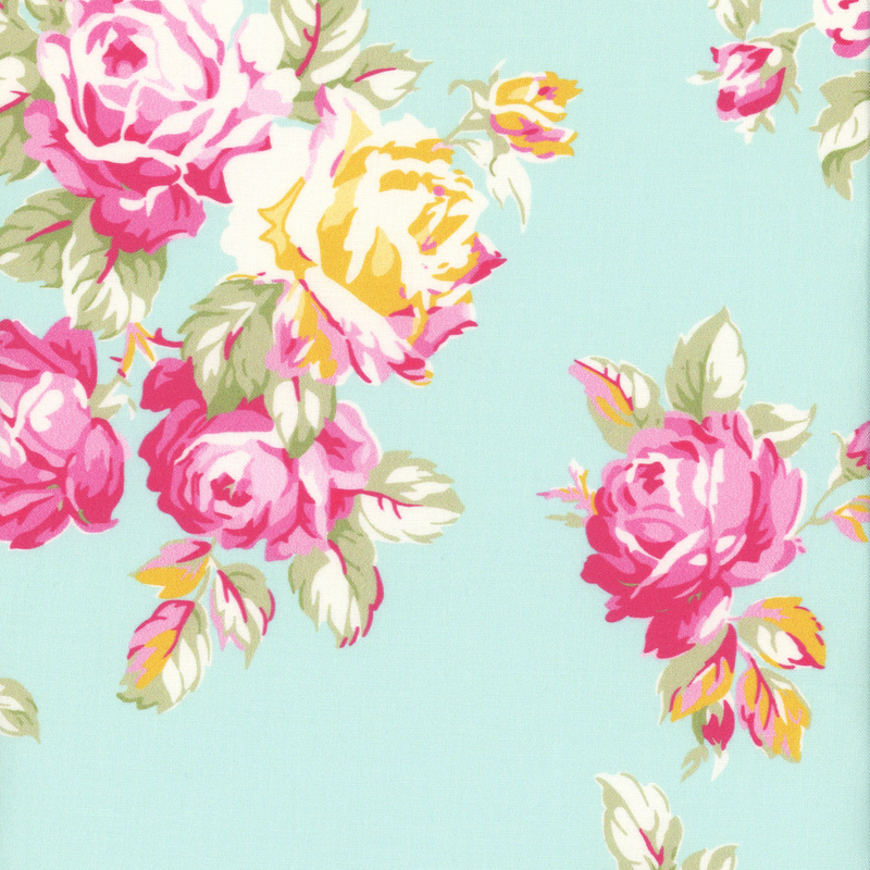 Light teal fabric with contrasting painterly pink and yellow roses and dusty green leaves on it