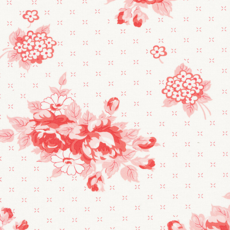 White fabric with tiny pink details and images of pink roses in an overexposed style all over.