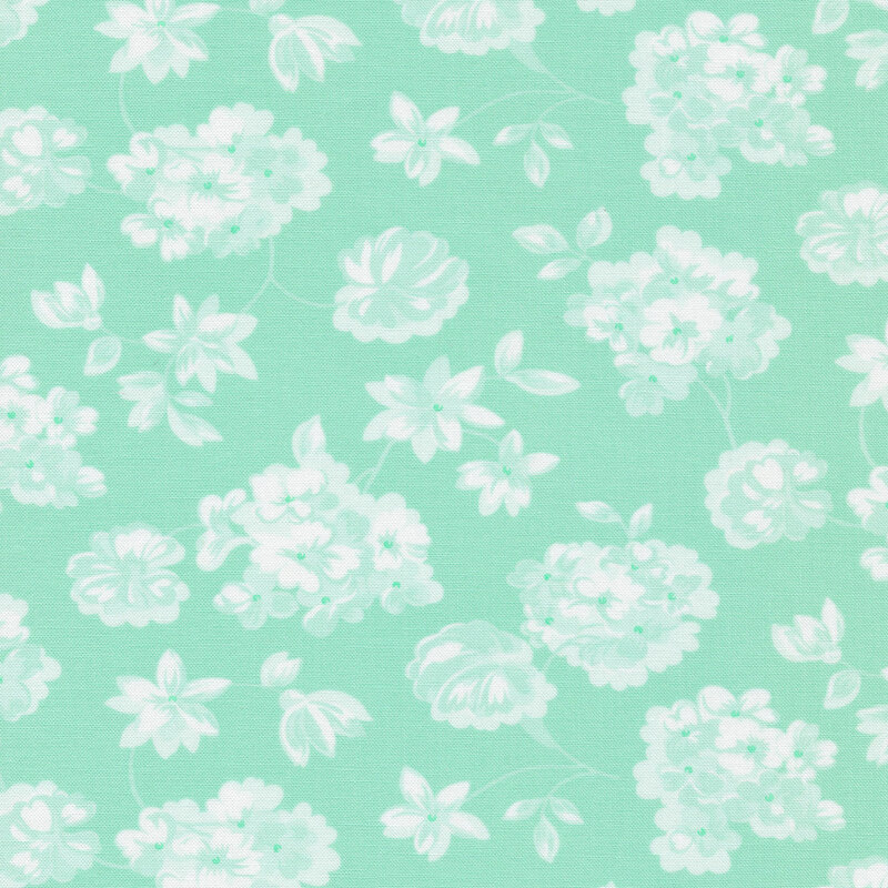 Aqua or mint colored fabric with tossed white impressionist styled flowers