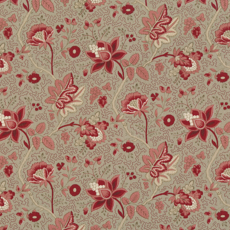 Floral fabric decorated with large pink and red flowers and leaves, accented with abstract lines on a gray background