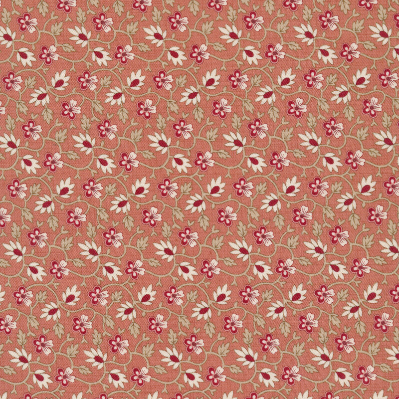 Floral fabric featuring small red flowers and cream leaf accents, connected by tan vines and set against a pink background