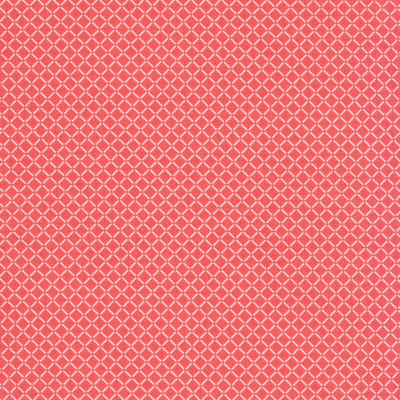 pink fabric with white dashed lines in a grid pattern