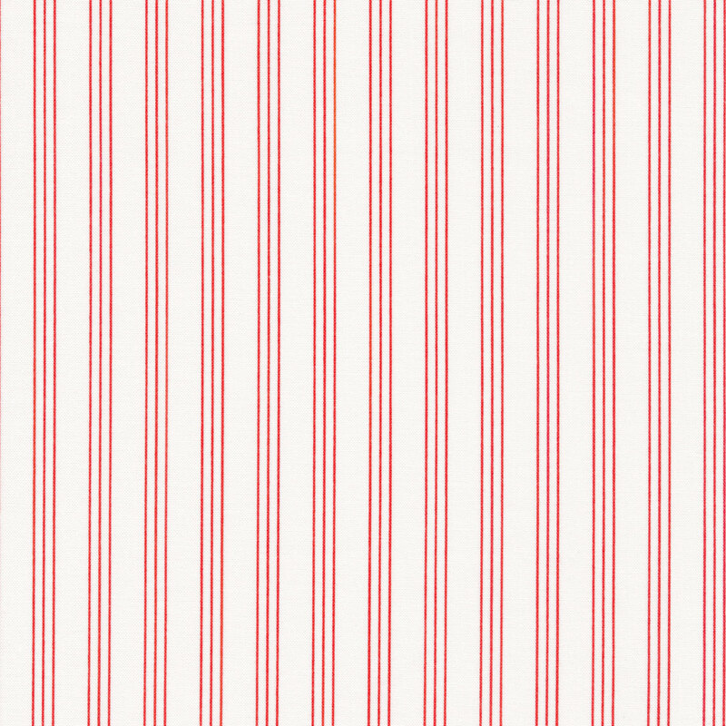 White fabric with groups of three red vertical pinstripes spaced evenly apart