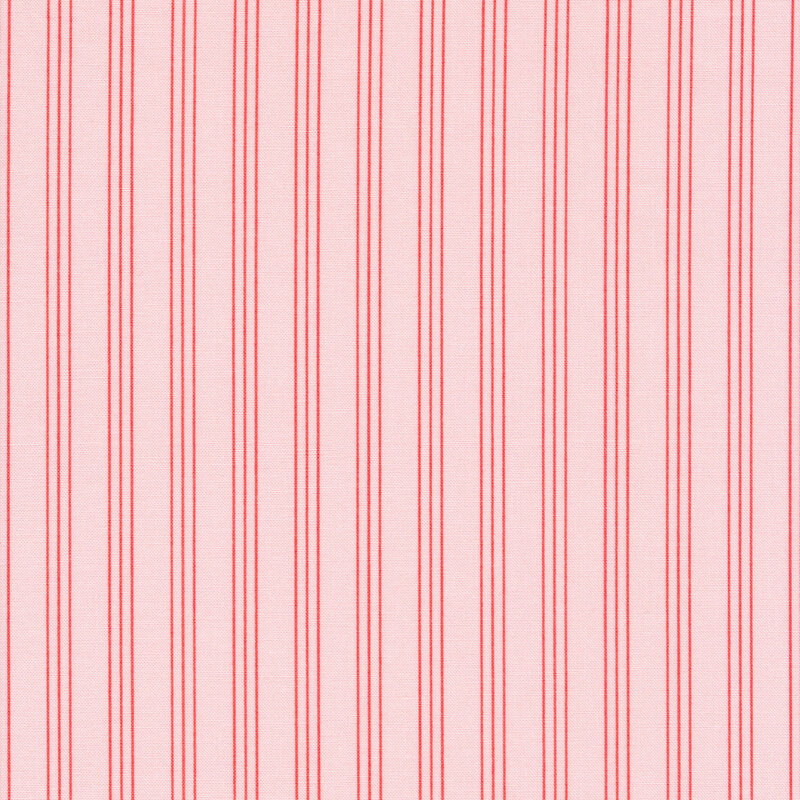 Light Pink fabric with groups of three pink vertical pinstripes spaced evenly apart