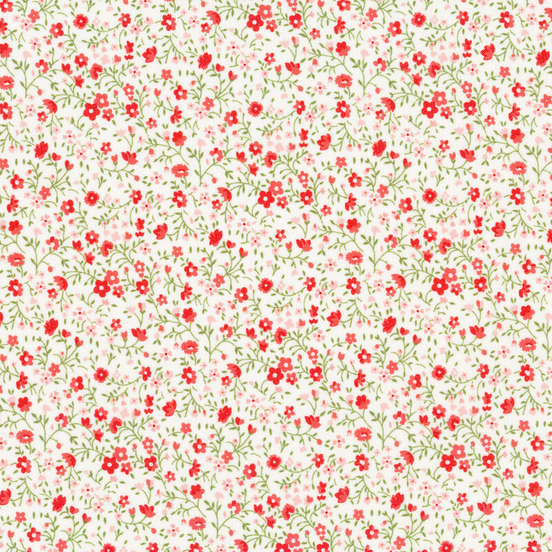 White fabric with tiny ditsy red flowers with green intertwining stems and leaves