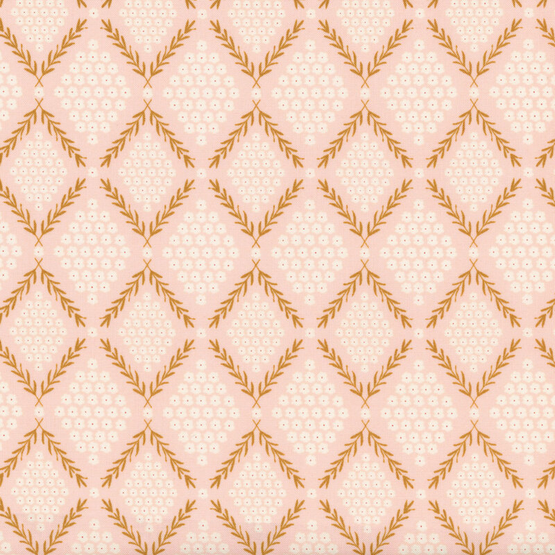 fabric with gold leafy vines bordering white flowers on a light pink background