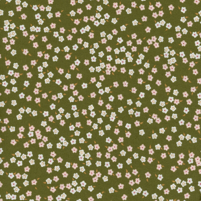 fabric with pink and white ditsy flowers on a deep green background