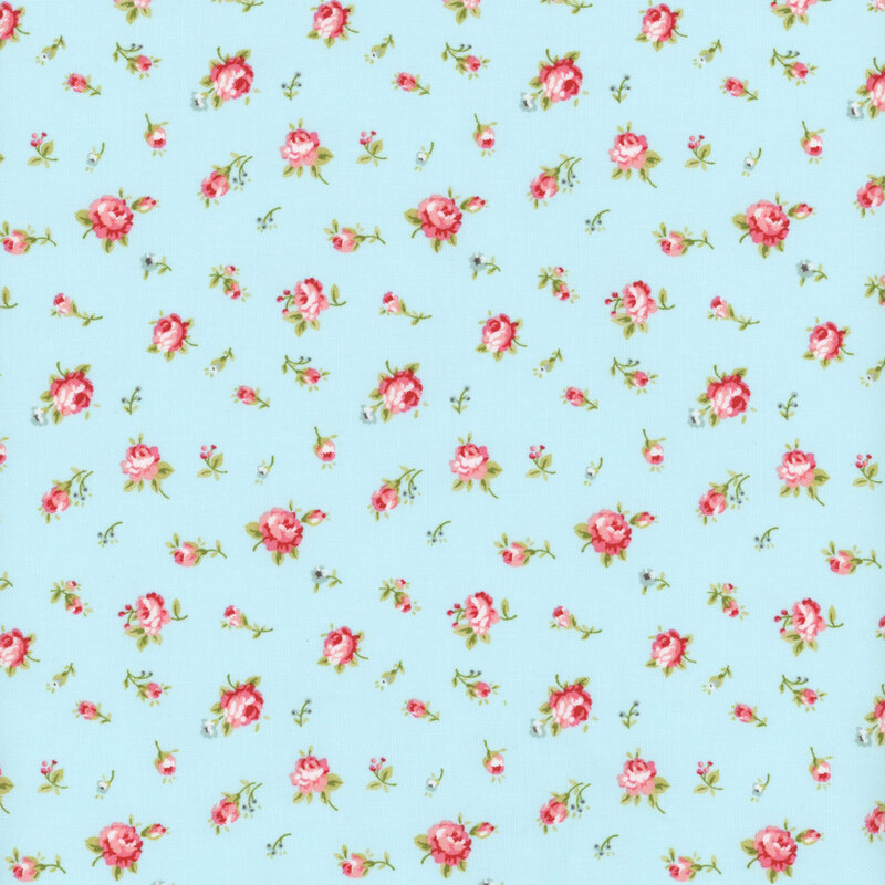 Floral fabric with a light blue background featuring pink roses in various stages of bloom, accented by small blue flowers
