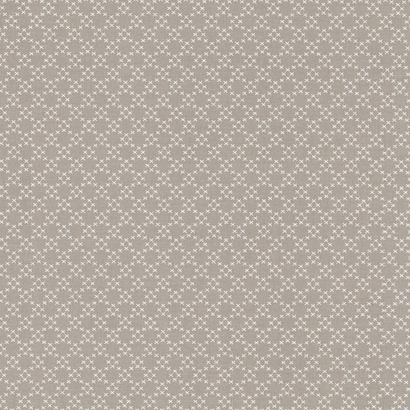 Fabric featuring a trellis pattern consisting of small white X-shapes, set against a gray background