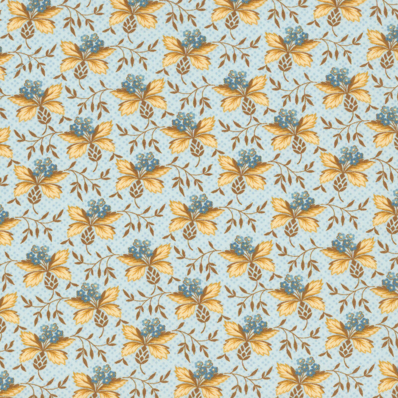 fabric featuring clusters of small blue flowers and beige leaves on a light blue background, accented by winding brown vines