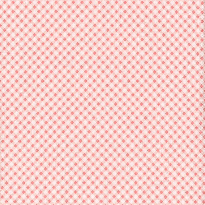 Fabric featuring a pink gingham pattern set against a light cream background