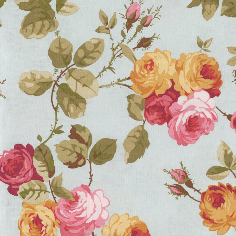 Image of fabric featuring a gray background with red, pink, and yellow roses, accented by thorny vines and leaves