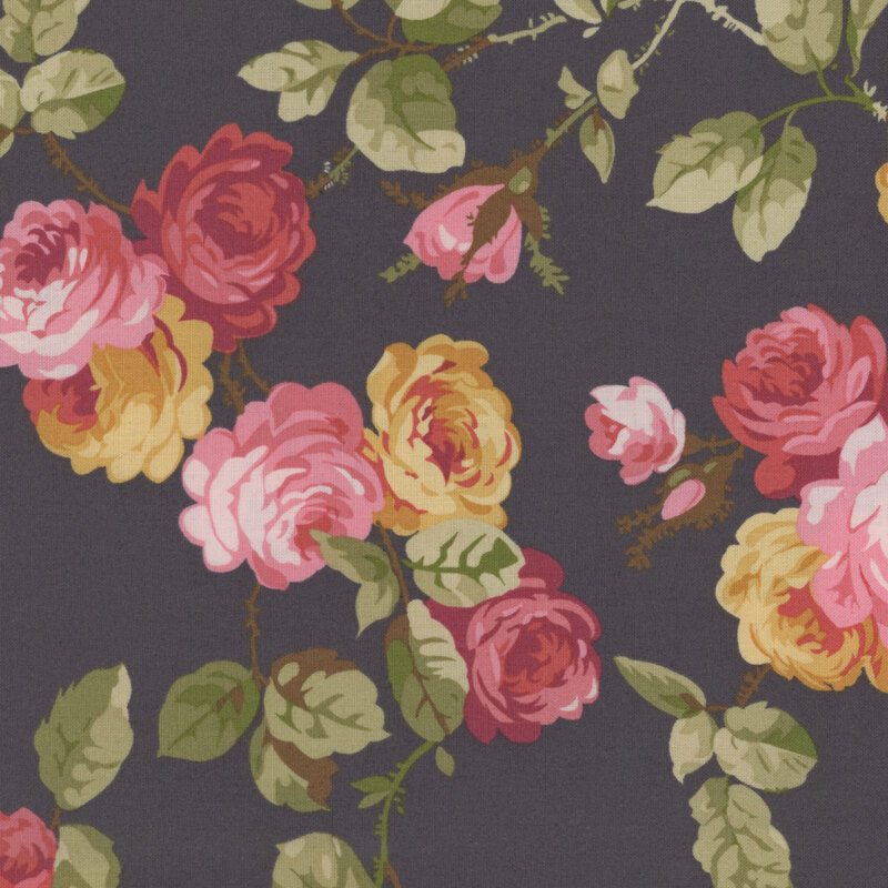 Image of fabric featuring a dark gray background with red, pink, and yellow roses, accented by thorny vines and leaves