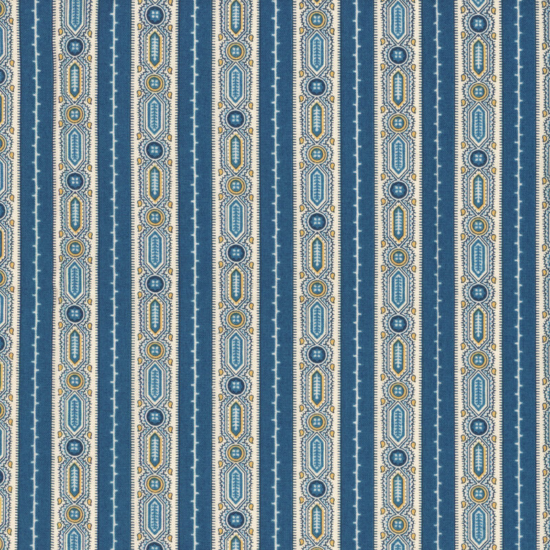 fabric featuring a blue and cream striped design, decorated with ornate geometric blue shapes in each cream stripe
