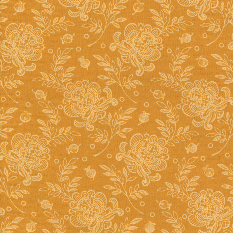 Swatch of fabric decorated with lacy tonal floral prints set against a dark yellow background