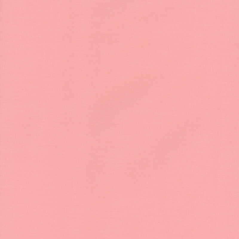 Swatch of light pink solid cotton fabric