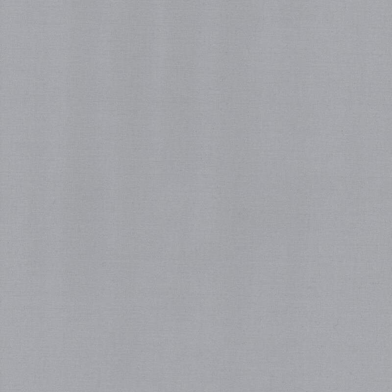 Swatch of gray solid cotton fabric, a hazy and smoky grey
