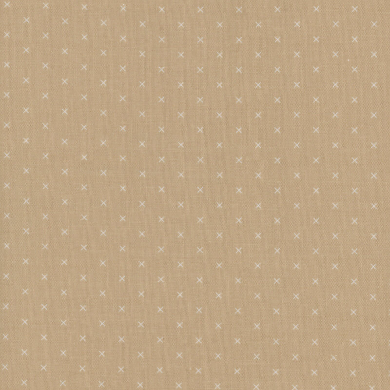 Swatch of fabric featuring tonal cream Xs on a tan background