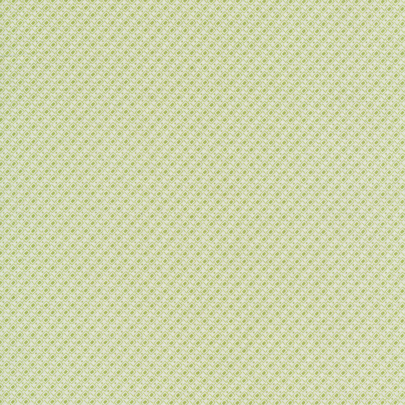 This fabric features green diamonds in a geometric pattern on a white background