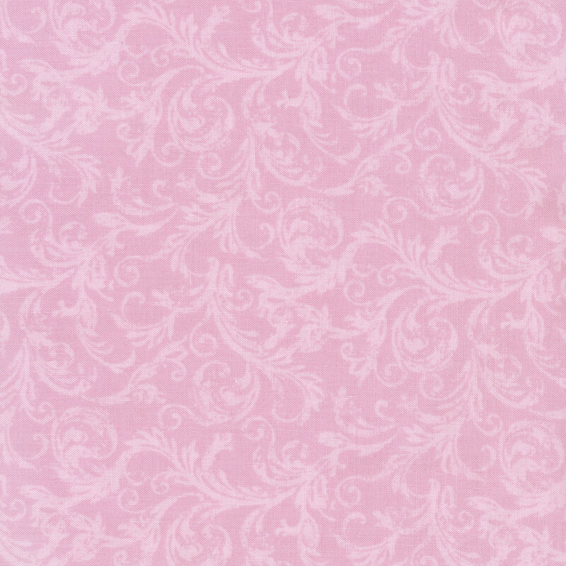 Pink fabric with lighter tonal swirls across it