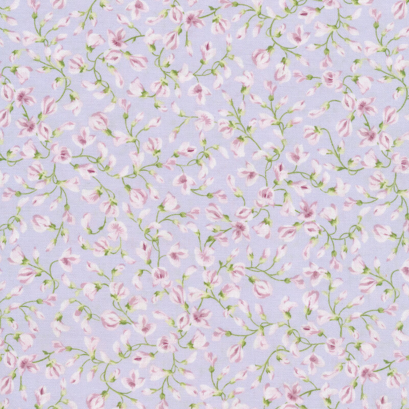 Light purple fabric with winding green vines and light pink lilac buds across it 