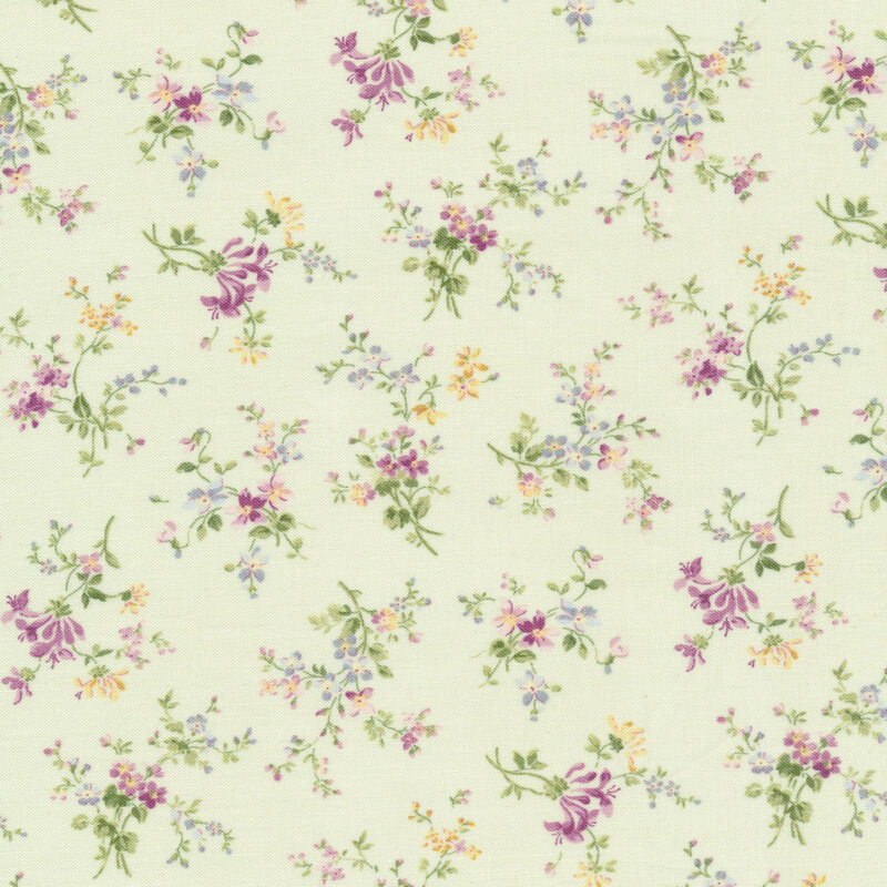 Light green fabric with clusters of pink, yellow, and blue flowers scattered on it