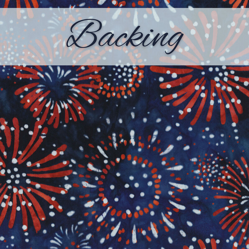 Dark blue batik fabric with red and white fireworks all over.