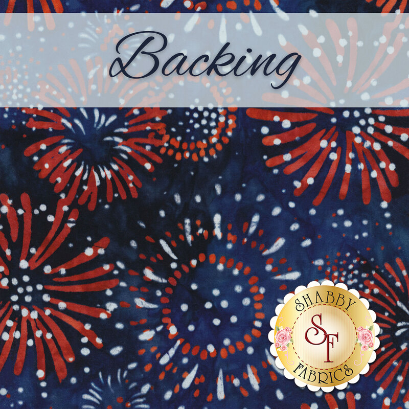 A swatch of dark blue batik fabric with red and white fireworks all over. A translucent white banner at the top reads 