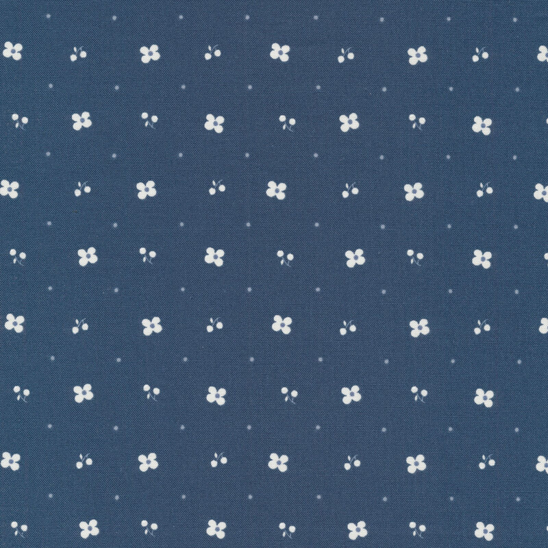 pairs of cream blueberries on dark navy blue fabric with small cream blossoms and dots evenly spaced apart