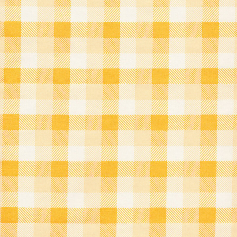 Image of fabric featuring a plaid gradient on a light yellow background