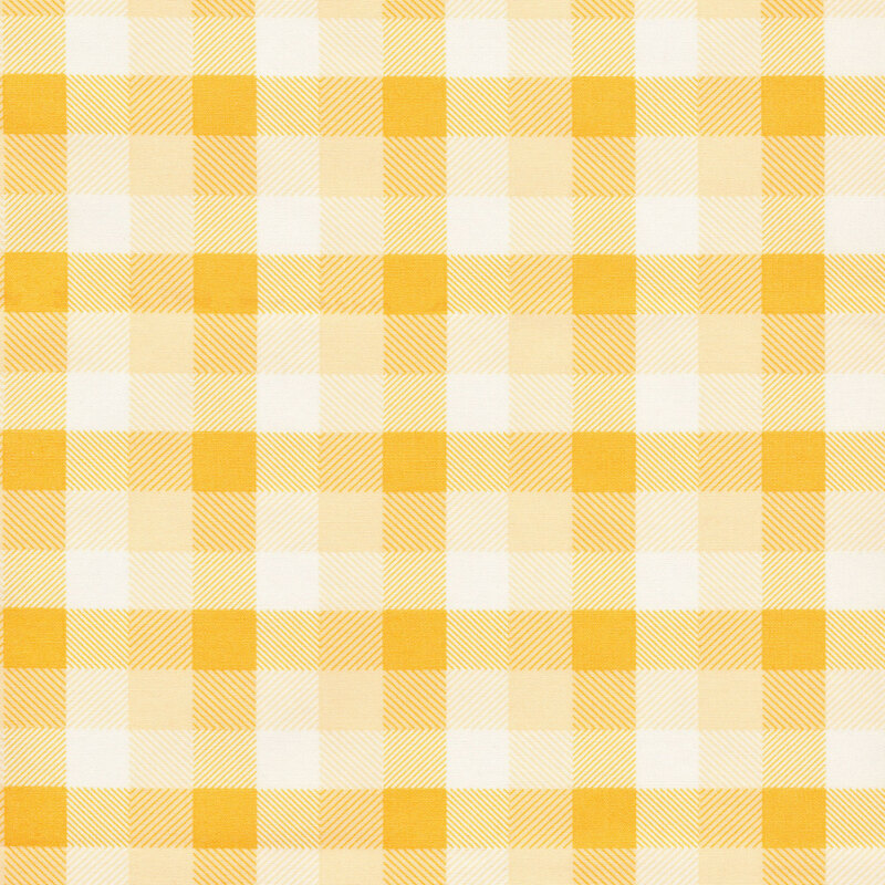Image of fabric featuring a plaid gradient on a light yellow background