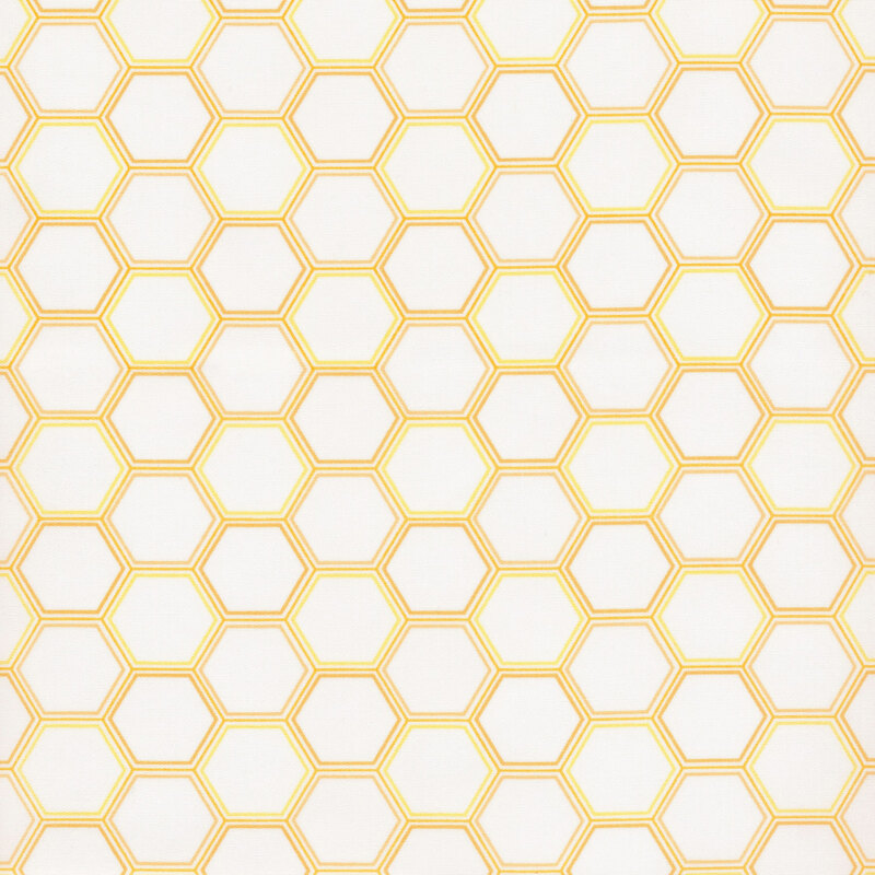 fabric featuring a geometric pattern of hexagons set against a light yellow background