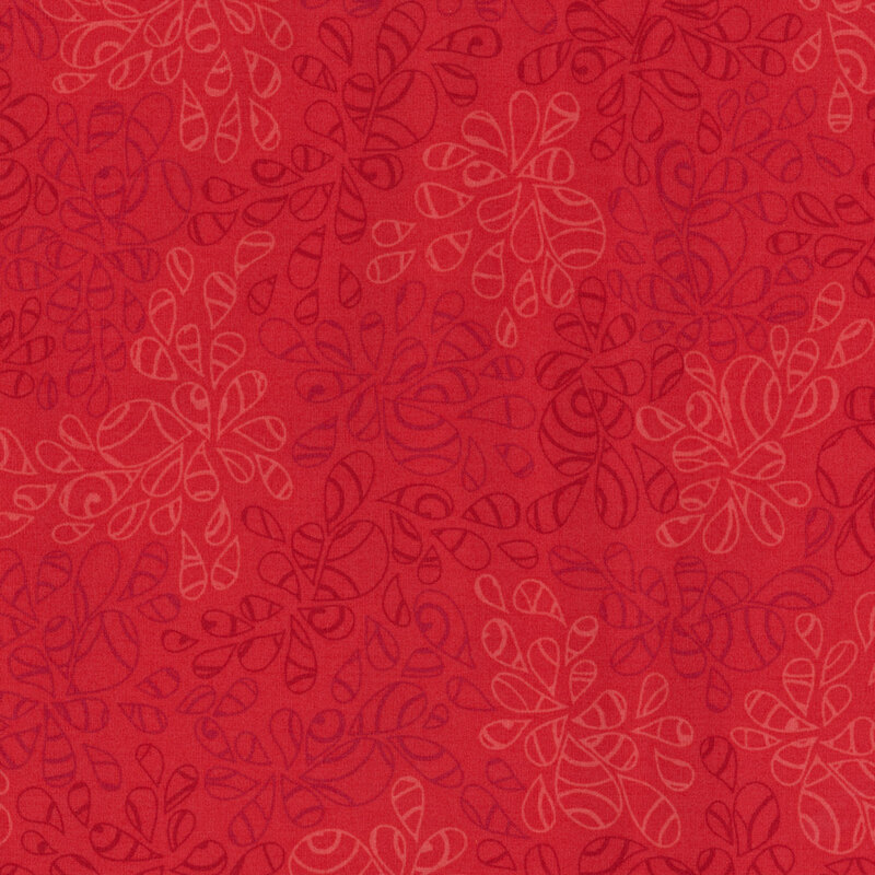 fabric featuring abstract leaf-like pattern full of scrolls and swirls in various shades of vibrant red