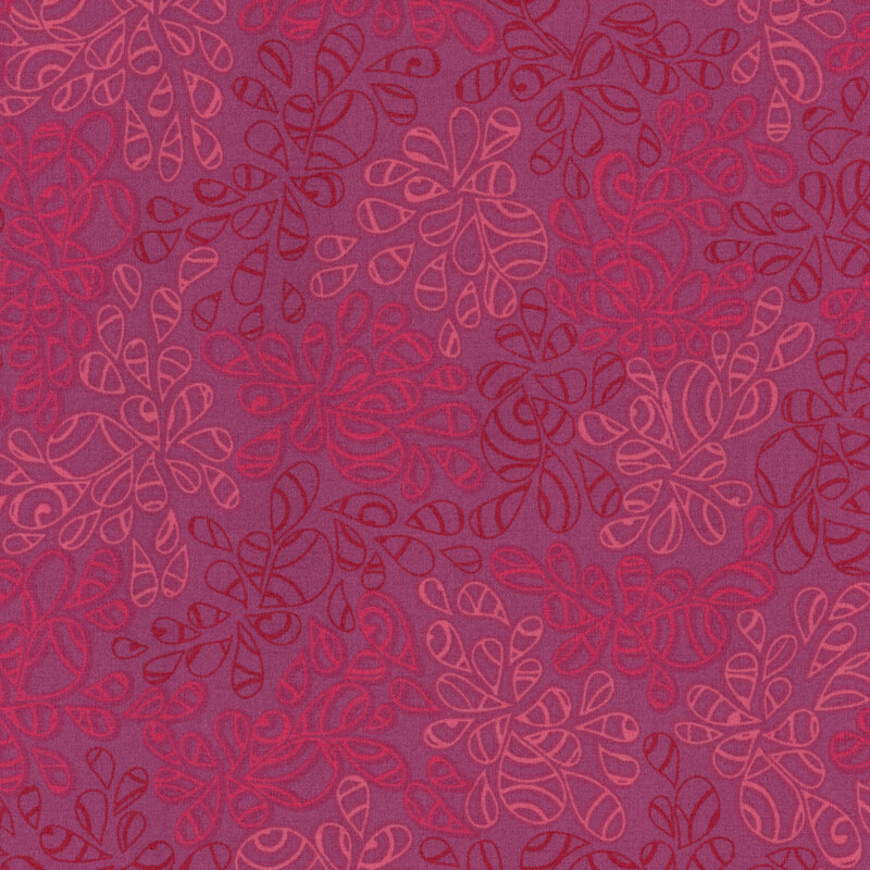 fabric featuring abstract leaf-like pattern full of scrolls and swirls in various shades of fuchsia, hot pink and light pink accents