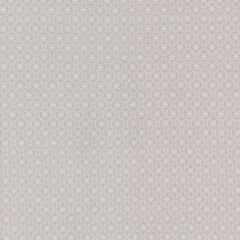 This fabric features a lovely scrolling geometric pattern in tonal gray.
