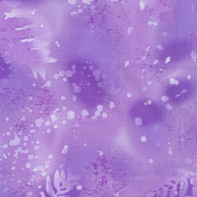 variegated purple fabric with light splatters and mottling