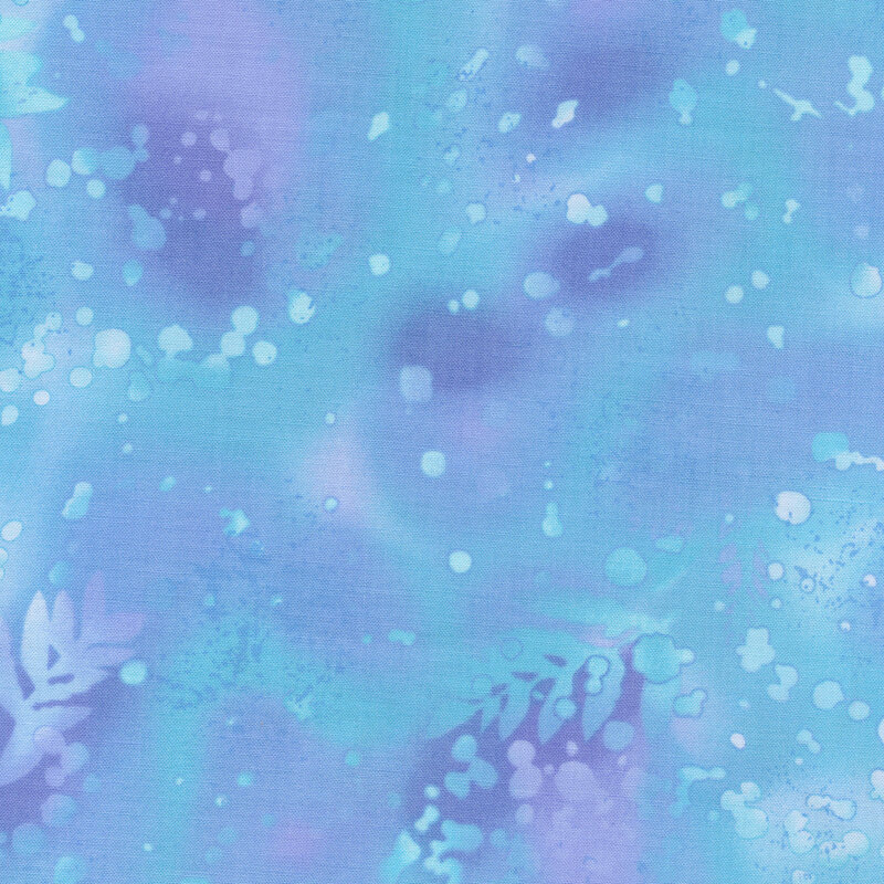 variegated blue fabric with light splatters and purple and white mottling