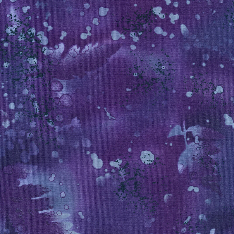 variegated dark purplish blue fabric with light splatters and mottling