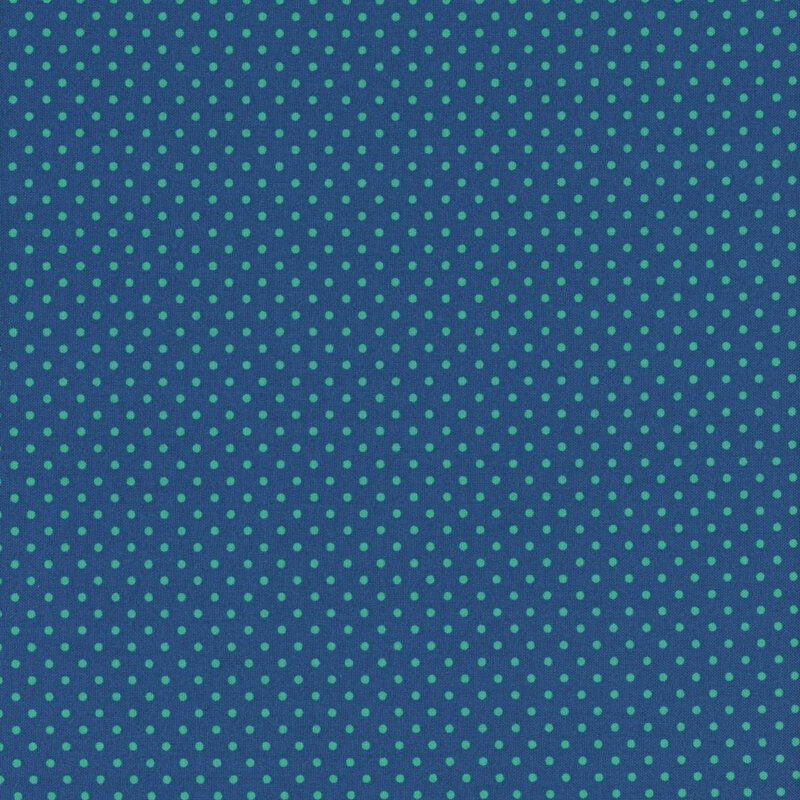 this fabric features a dark blue fabric with ditsy teal polka dots