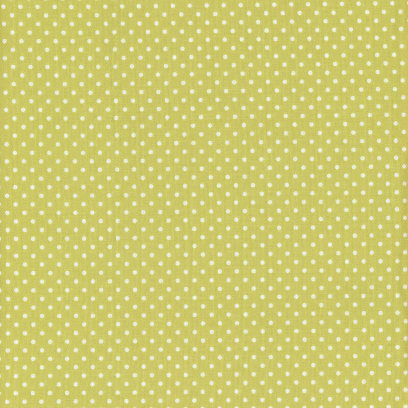 this fabric features fun bright green with ditsy white polka dots