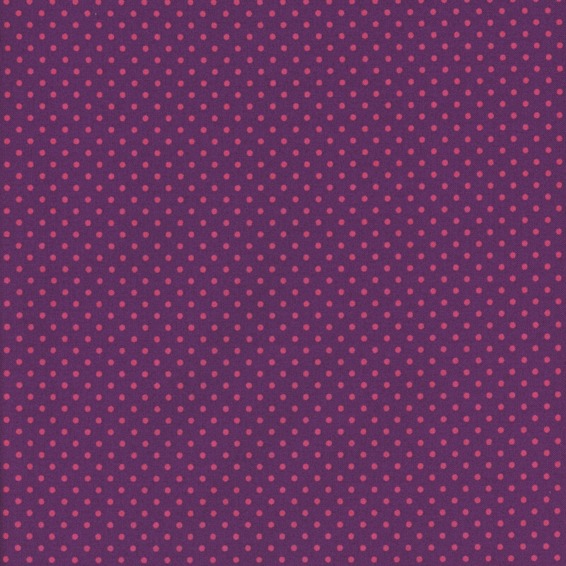 this fabric features a bold magenta purple with ditsy pink polka dots
