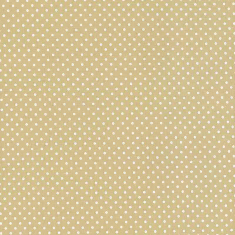this fabric features a sunny warm tan fabric with ditsy white polka dots