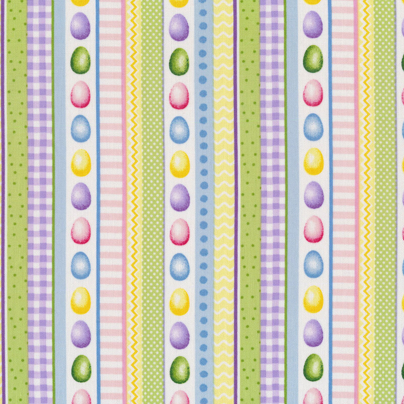 This fabric features multicolored vertical stripes of eggs, squiggly lines and various basic prints