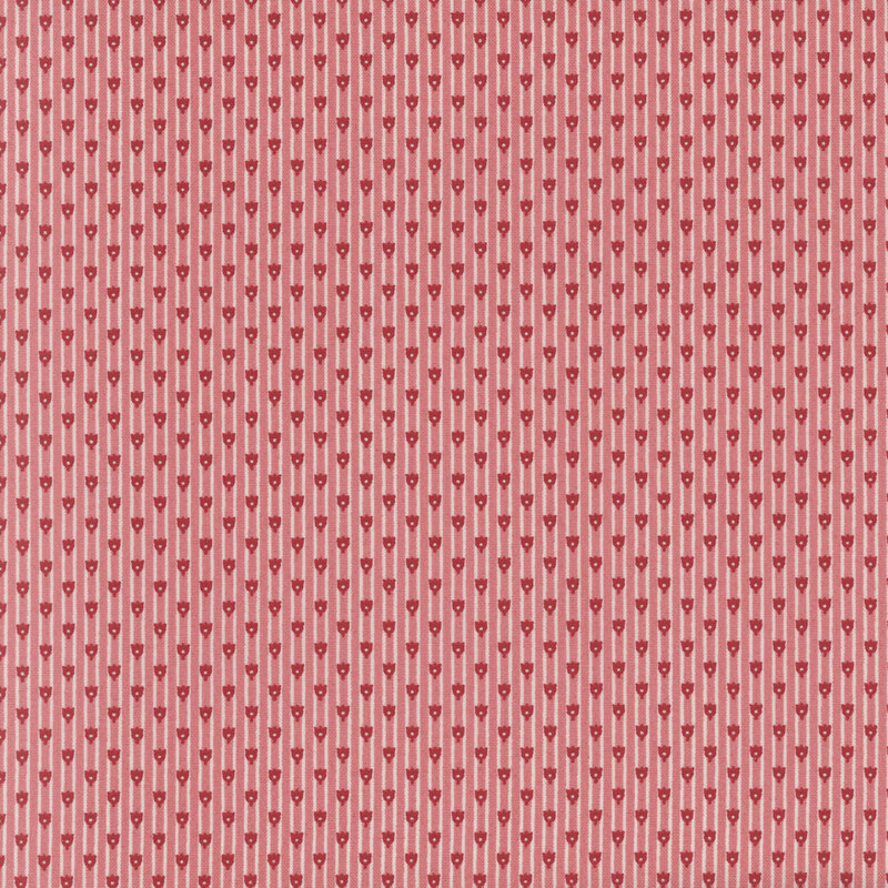 fabric featuring white and pink stripes with red motifs