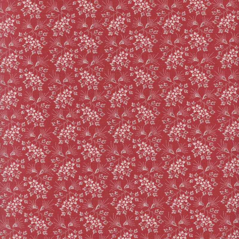 fabric featuring cream white florals and vines on a dark red background