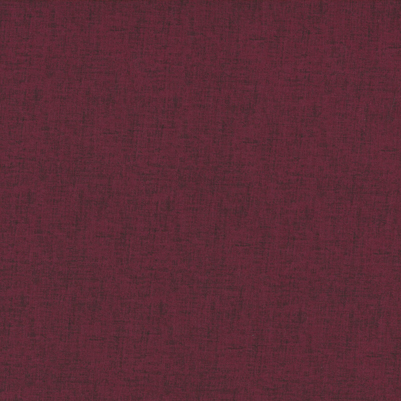 this fabric features a dark plum purple basic fabric with a linen texture