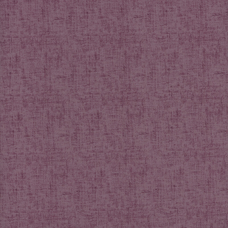 this fabric features a light purple basic with linen texture