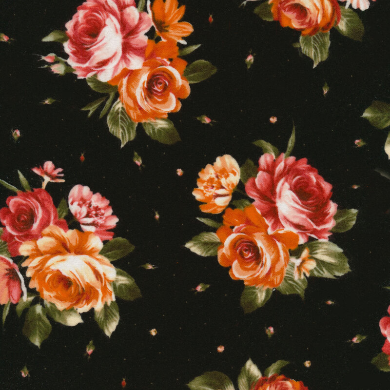 Black fabric covered in rustic orange and red roses accented by warm green leaves and tiny scattered rose buds