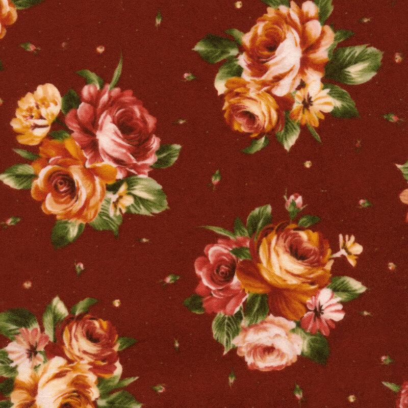 Warm red fabric covered in rustic orange and red roses accented by warm green leaves and tiny scattered rose buds